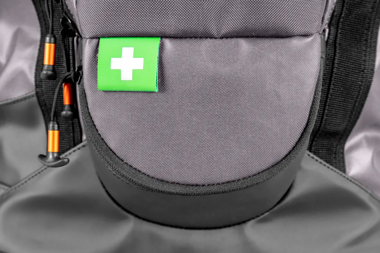 Easy to find first aid pocket.
