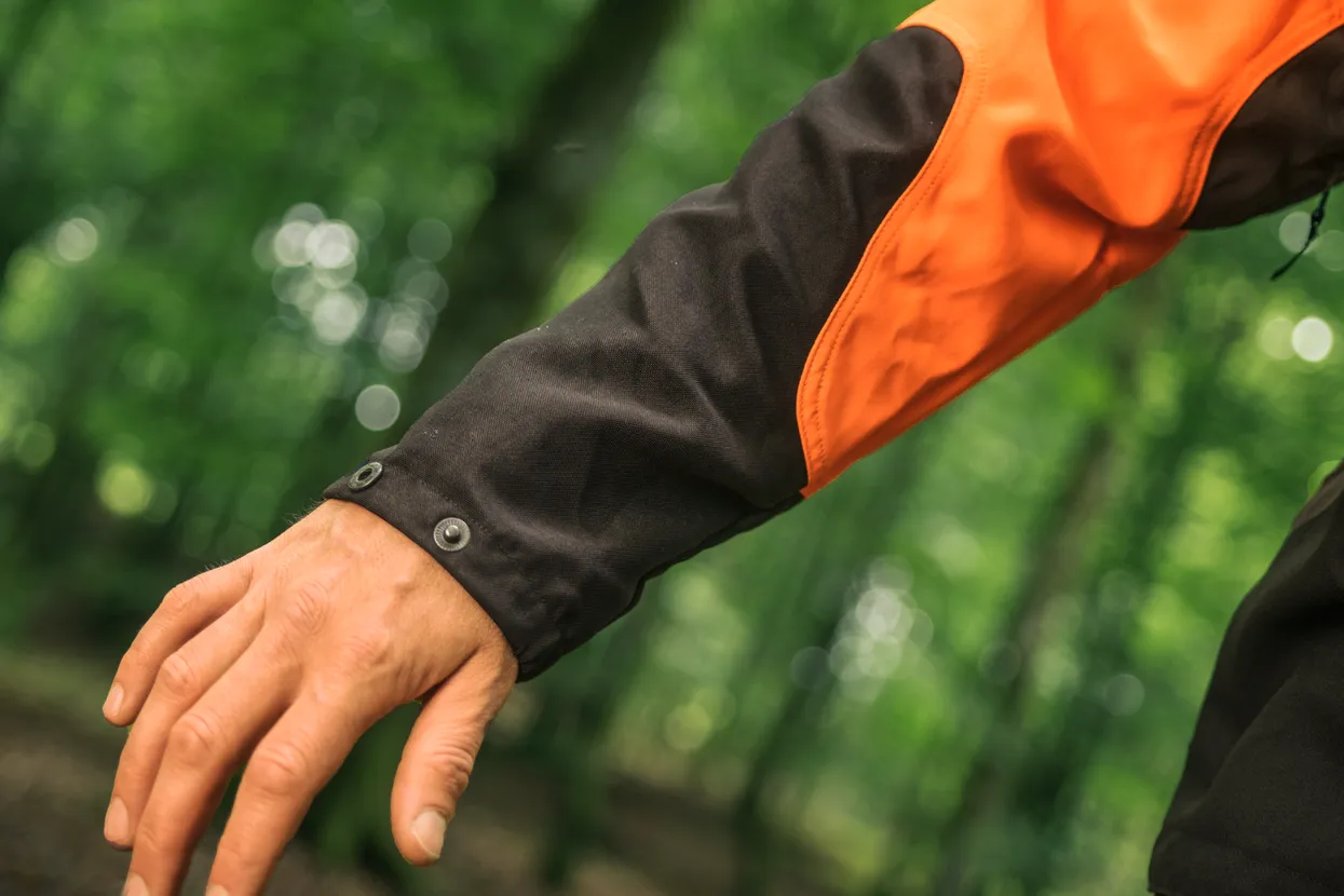 Reinforcement around wrists and lower part of sleeves