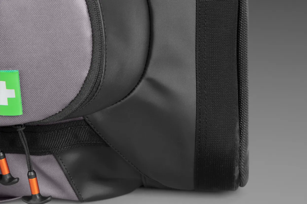 Durable, water resistant fabric and a reinforced bottom to provide protection.