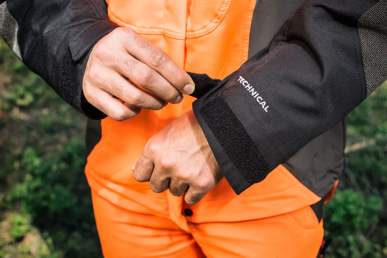Hook and loop adjustment at end of sleeves